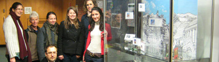Students with their 'Small-scale Experimental Machine' display